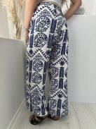 Nem rugalmas anyagú, lenvászon hatású, gumis derekú, egyenes szárú, lenge öves nadrág. (XS-M méretre ajánljuk.)