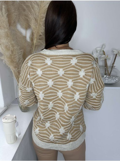 Rugalmas, vastag kötött anyagú, mintás pulóver. (S-L méretre ajánljuk.)