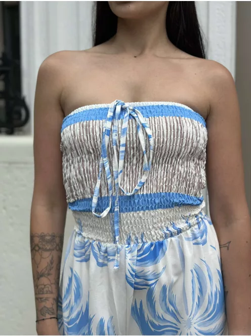 Lenge fazonú, egyenes szárú, nem rugalmas anyagú, felső része gumírozott, pánt nélküli overál. (S-L méretre ajánljuk.)