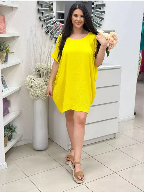 Lenge fazonú, hátán nyitott, pántos, nem rugalmas anyagú ruha. (S-XL méretre ajánljuk.)