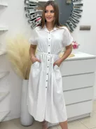 Lenge fazonú, derékban összehúzható, megkötős, zsebes, gombos, nem rugalmas anyagú ruha. (S-L méretre ajánljuk.)