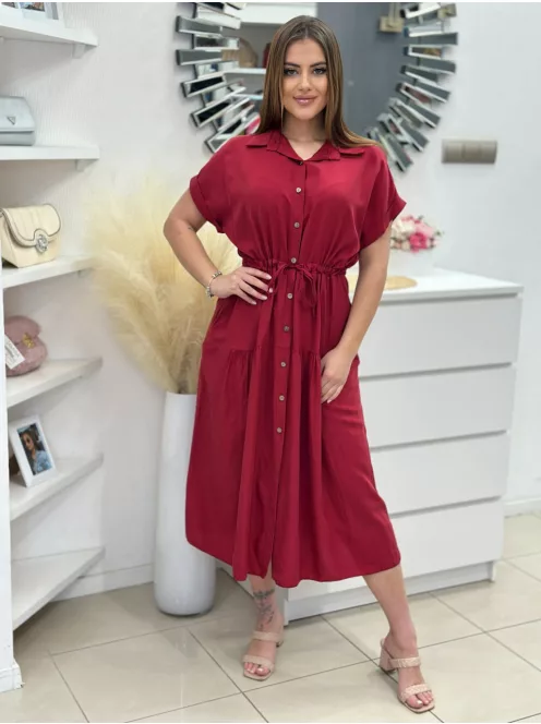 Lenge fazonú, derékban összehúzható, megkötős, zsebes, gombos, nem rugalmas anyagú ruha. (S-L méretre ajánljuk.)