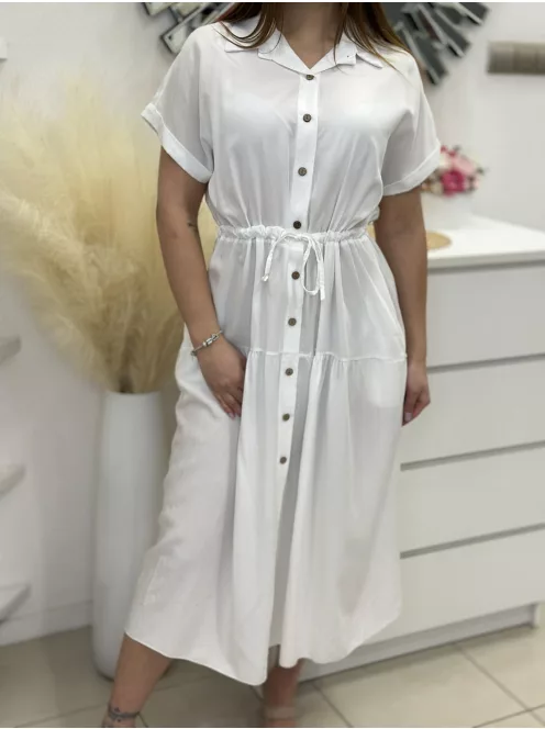 Lenge fazonú, derékban összehúzható, megkötős, zsebes, gombos, nem rugalmas anyagú ruha. (S-L méretre ajánljuk.)