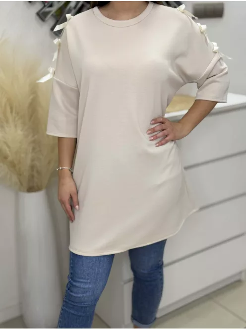 Vállán masnis tunika