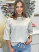 Vállán masnis felső