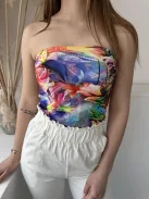 Rugalmas, mellrésznél gumis, dupla anyagú, mintás, pánt nélküli felső. (XS-M méretre ajánljuk.)