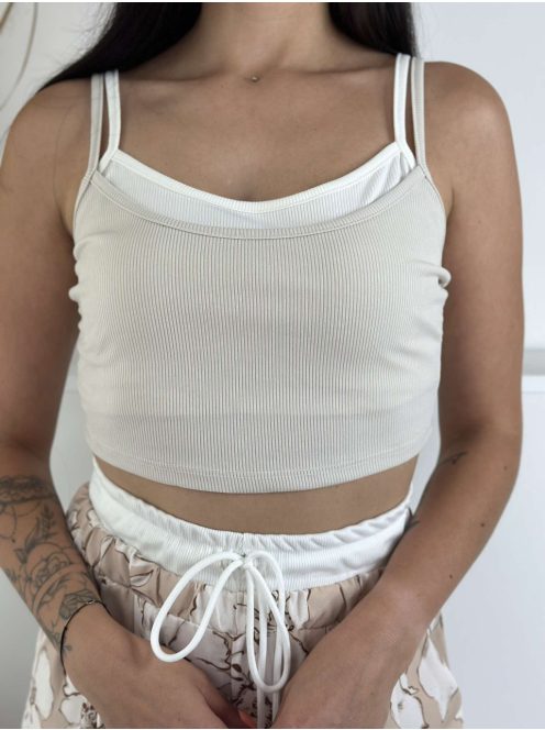 Lenge, csinos szett. Rugalmas, dupla anyagú, rövid derekú, pántos top, magas, gumis derekú, nem rugalmas anyagú, zsebes, megkötős nadrággal.