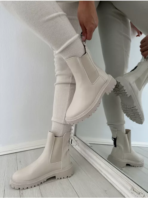 Műbőr, bokánál gumírozott, belül bolyhos bokacsizma. Vigyázz! Kis méretezés! Egy számmal nagyobb méretet ajánlunk! (36-41-es méretekben.)