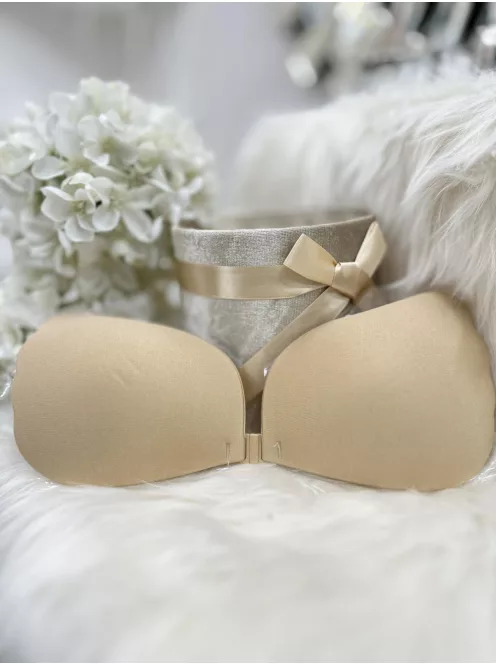 Öntapadós, középen kapcsos, szatén hatású, belül szilikonos, többször használatos melltartó.