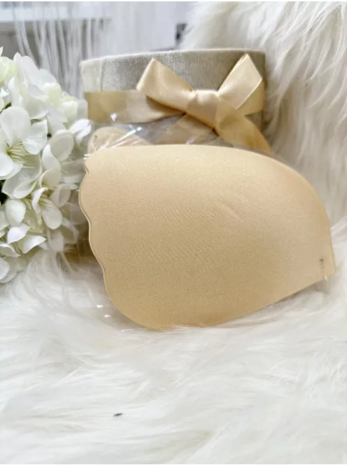 Öntapadós, középen kapcsos, szatén hatású, belül szilikonos, többször használatos melltartó.