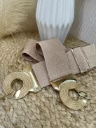 Rugalmas, vastag, gumis, fémcsatos öv.