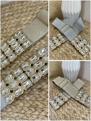   Rugalmas, gumis, állítható méretű, kövekkel díszített, fémcsatos öv.