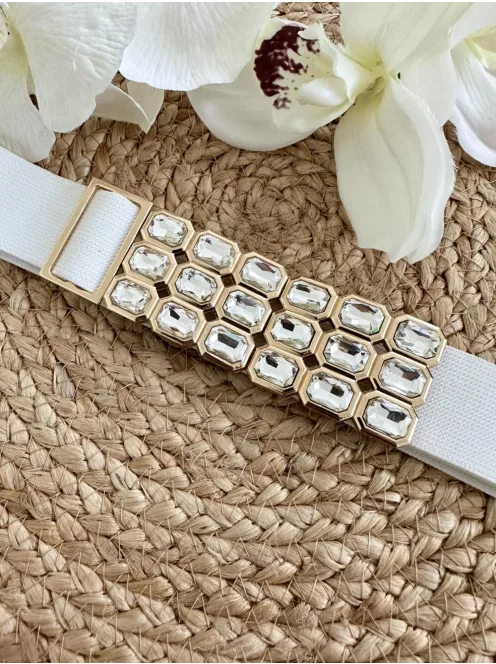 Rugalmas, gumis, állítható méretű, kövekkel díszített, fémcsatos öv.