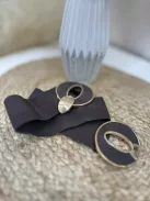 Rugalmas, gumis, arany csatos öv .