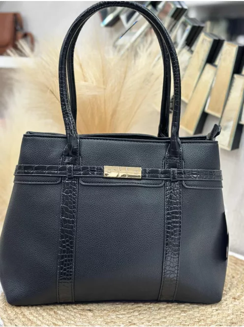 Műbőr, merev fazonú táska, levehető hosszúpánttal.