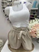 Rugalmas anyagú, mikroszálas, belevarrt, push up, szivacsbetétes, keresztpántos top. M/L és XL/XXL méretekben.