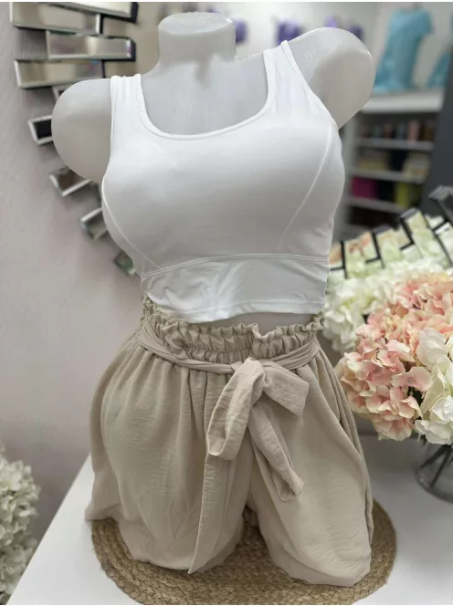 Rugalmas anyagú, mikroszálas, belevarrt, push up, szivacsbetétes, keresztpántos top. M/L és XL/XXL méretekben.