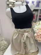 Rugalmas anyagú, mikroszálas, belevarrt, push up, szivacsbetétes, keresztpántos top. M/L és XL/XXL méretekben.