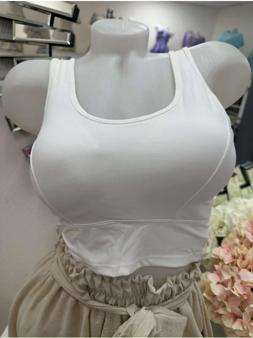 Rugalmas anyagú, mikroszálas, belevarrt, push up, szivacsbetétes, keresztpántos top. M/L és XL/XXL méretekben.