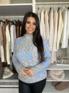 Rugalmas, puha anyagú, lenge fazonú, mintás, kötött pulóver. (S-L méretre ajánljuk.)