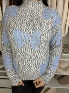 Rugalmas, puha anyagú, lenge fazonú, mintás, kötött pulóver. (S-L méretre ajánljuk.)