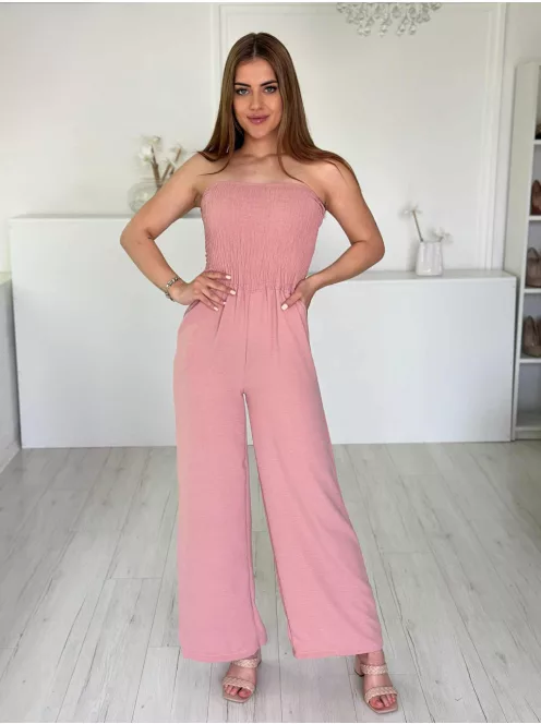 Lenge, egyenes szárú, felsú része gumírozott, nem rugalmas anyagú, zsebes, pánt nélküli overál. (S-L méretre ajánljuk.)