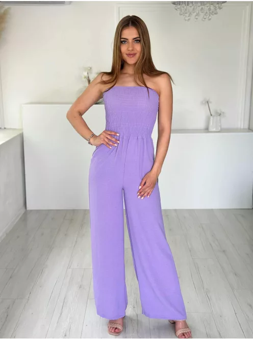 Lenge, egyenes szárú, felsú része gumírozott, nem rugalmas anyagú, zsebes, pánt nélküli overál. (S-L méretre ajánljuk.)