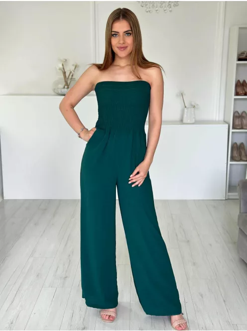 Lenge, egyenes szárú, felsú része gumírozott, nem rugalmas anyagú, zsebes, pánt nélküli overál. (S-L méretre ajánljuk.)