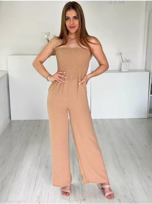 Lenge, egyenes szárú, felsú része gumírozott, nem rugalmas anyagú, zsebes, pánt nélküli overál. (S-L méretre ajánljuk.)